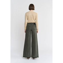 Load image into Gallery viewer, Person wearing a beige top and green wide-leg pants on a white background
