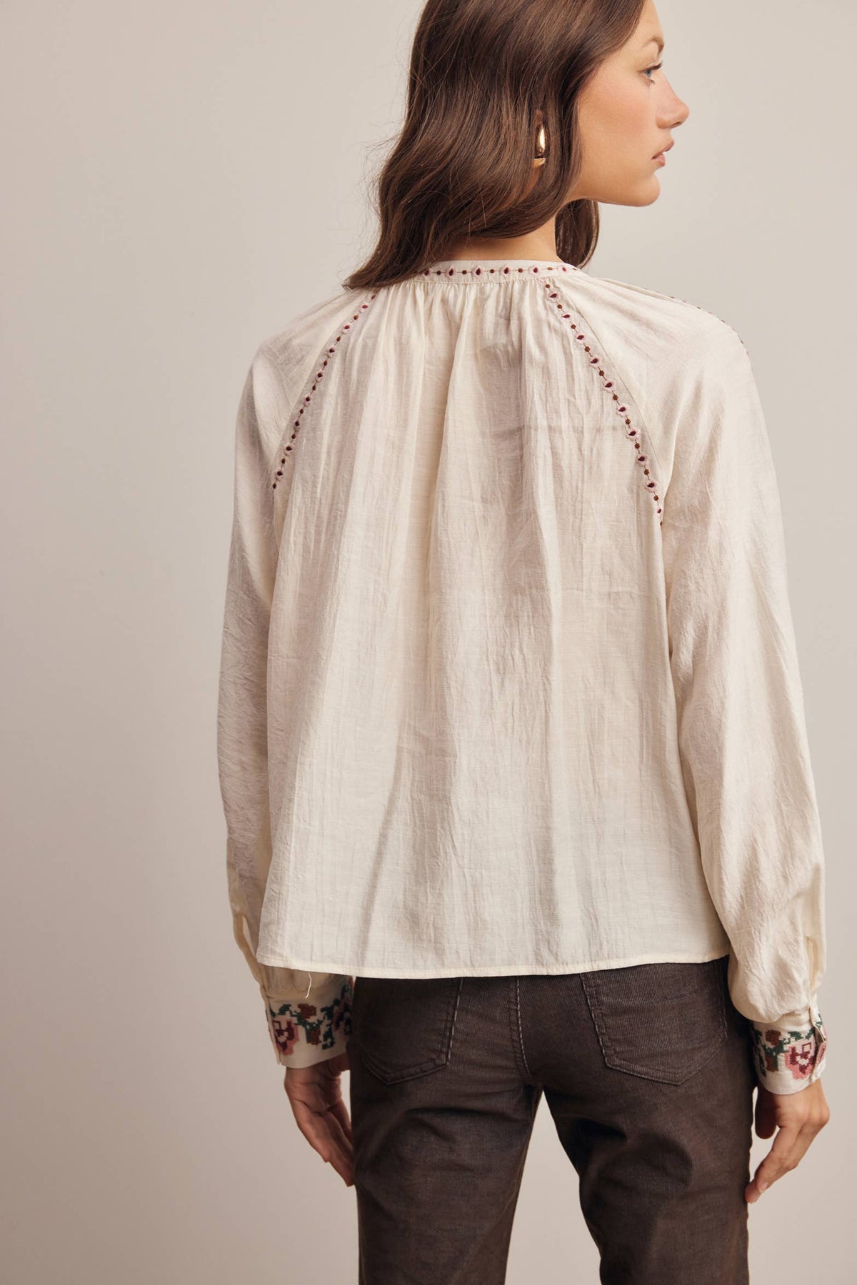 Floral Embroidered Tassel Tie Blouse