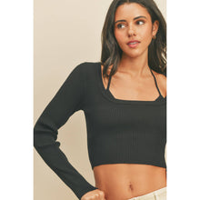 Load image into Gallery viewer, Woman wearing a black ribbed long-sleeve crop top against a beige background
